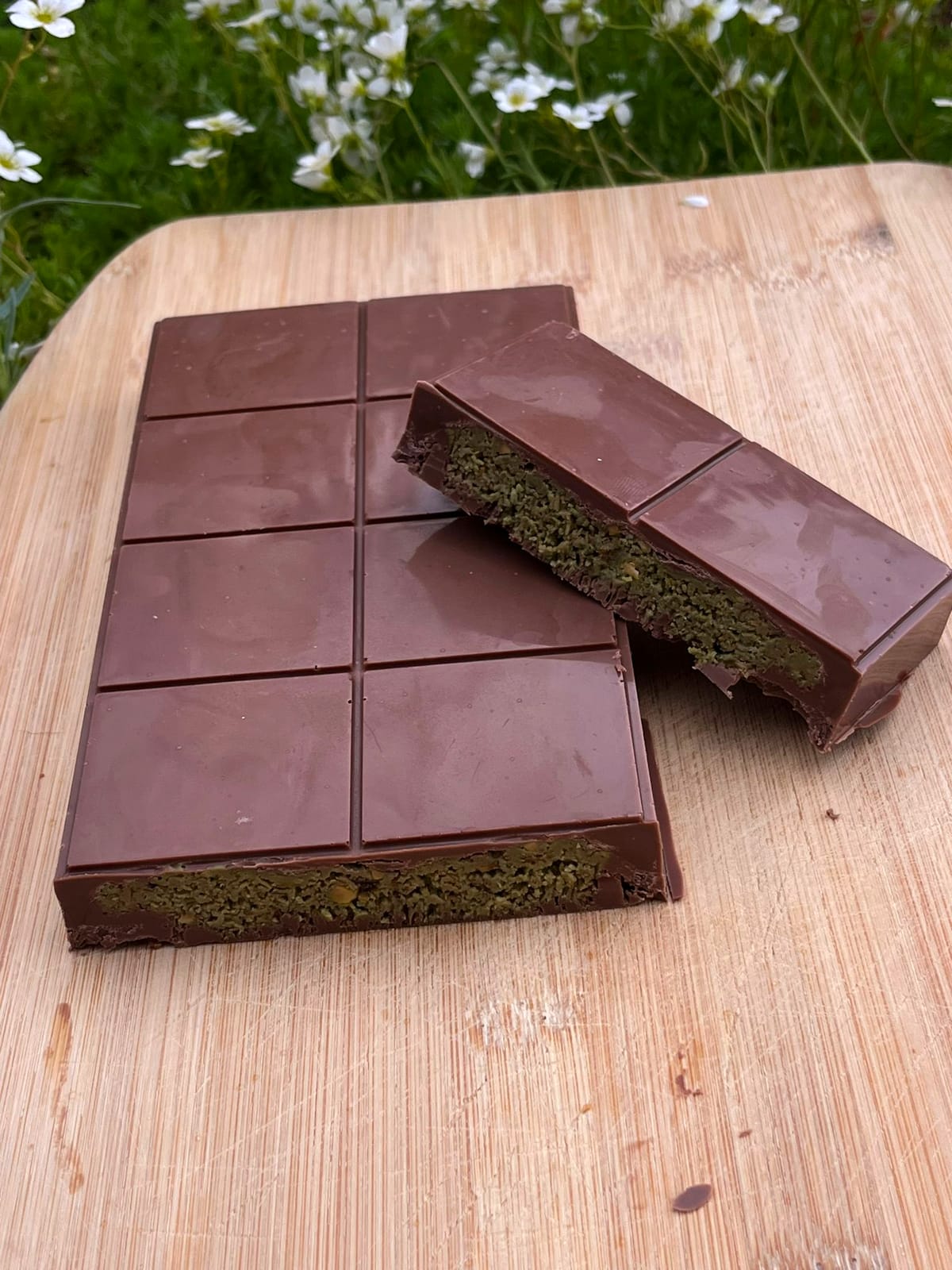 Homemade chocolate bars with pistachio filling